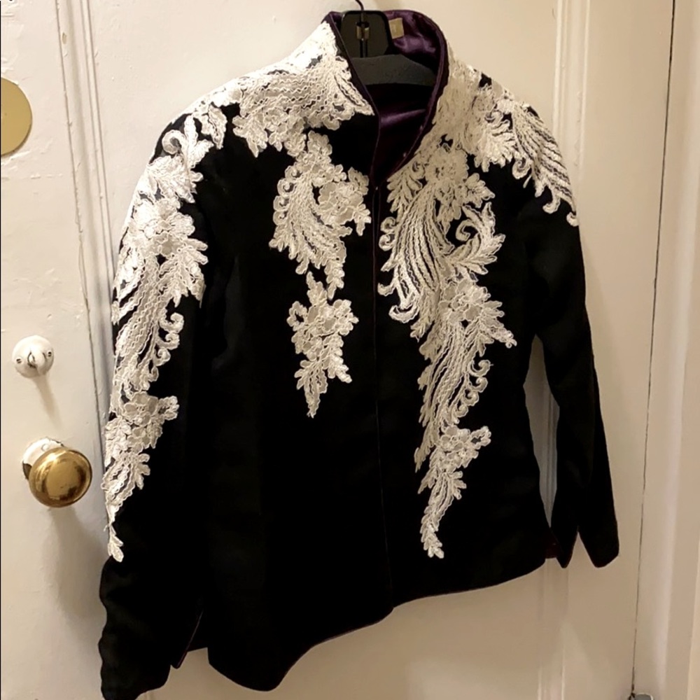 Black wool jacket with white lace detailing